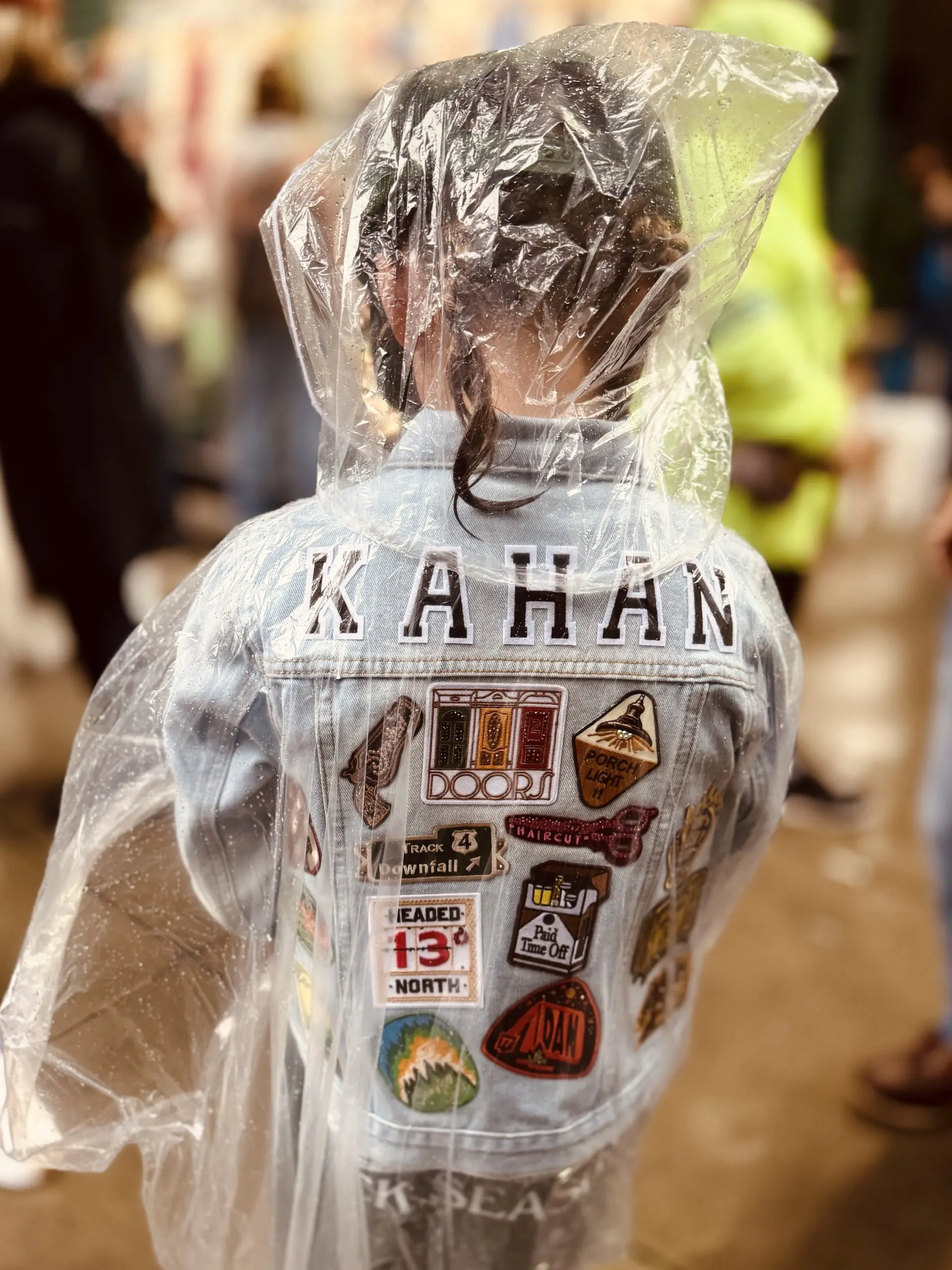 A young Kahan patron showing her homemade jacket.
