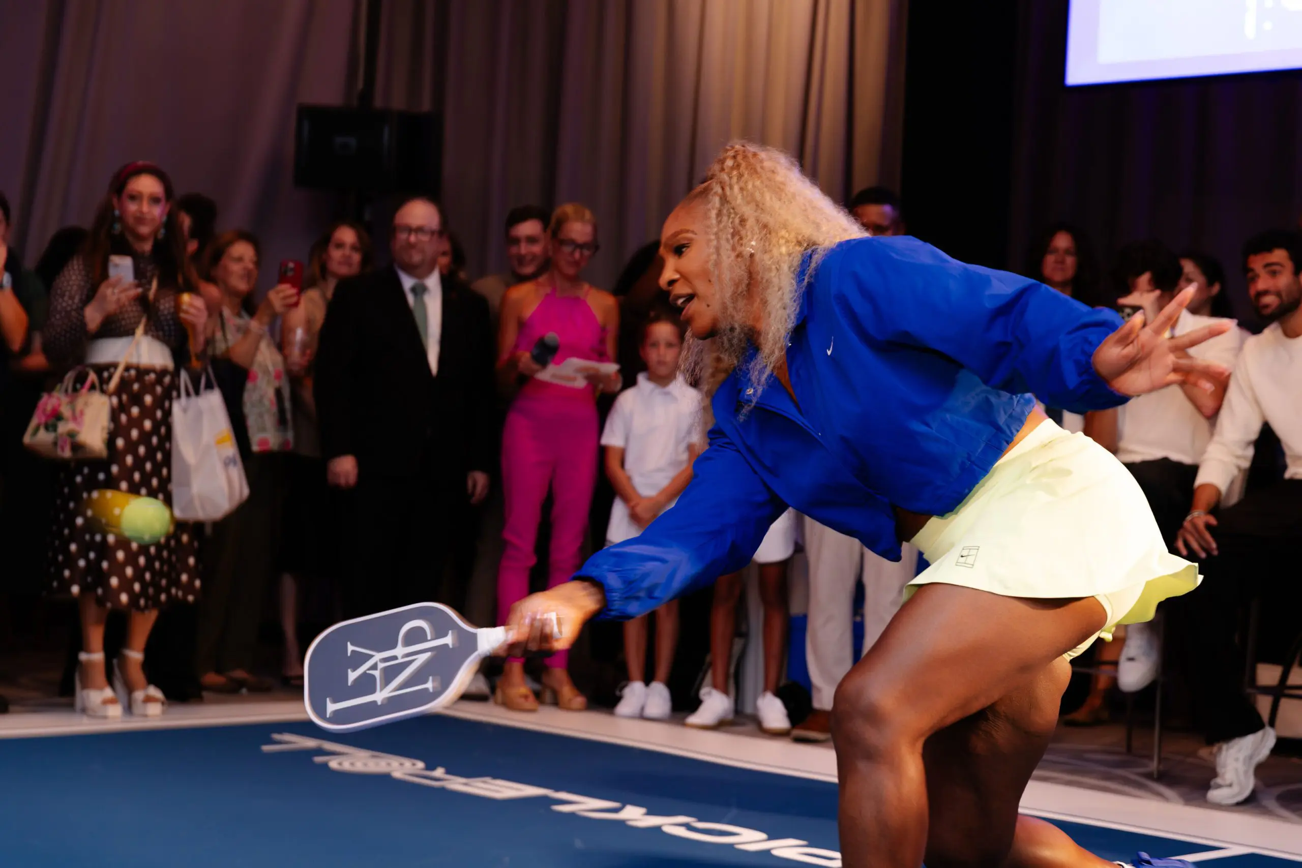 Serena Williams hitting ball during pickleball tournament