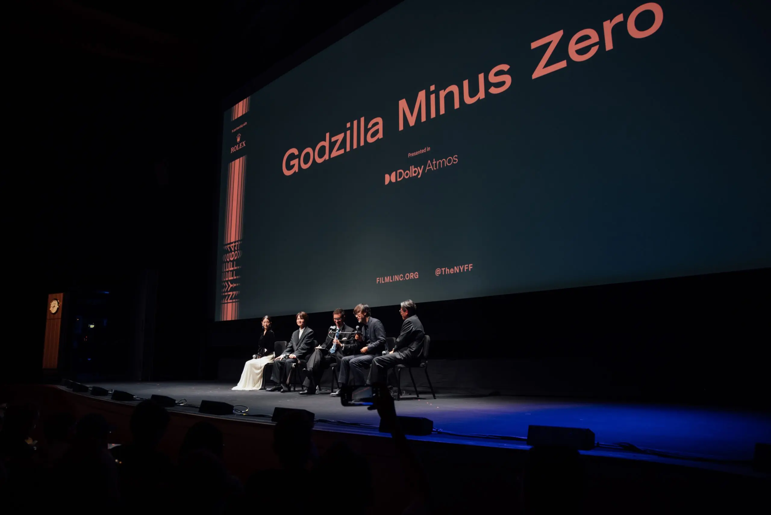 Takashi Yamazaki, Ryunosuke Kamiki and Minami Hamabe participate in a post-screening discussion beneath the Godzilla Minus Zero title at Alice Tully Hall.