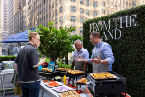 Bill Duesenberg and Darryl Postelnick present the ALDI Summer Grill Out From The Land menu, including burgers, chicken skewers and vegetable skewers made with premium ALDI ingredients.