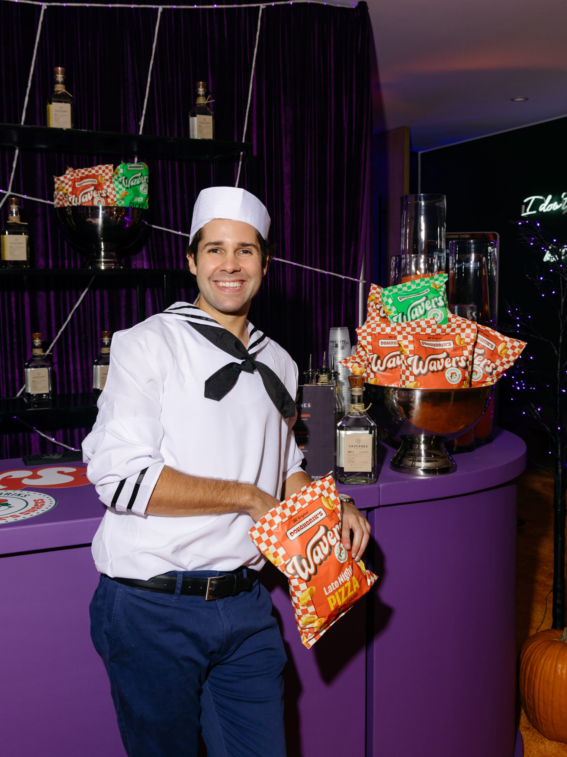 David Dobrik hosts his annual Halloween bash dressed as a sailor, featuring his new snack brand Wavers, Cazcanes Tequila, Roobet Casino and Doughbrik's Pizza and a headlining performance by Ty Dolla Sign, powered by Rumor and Young LA