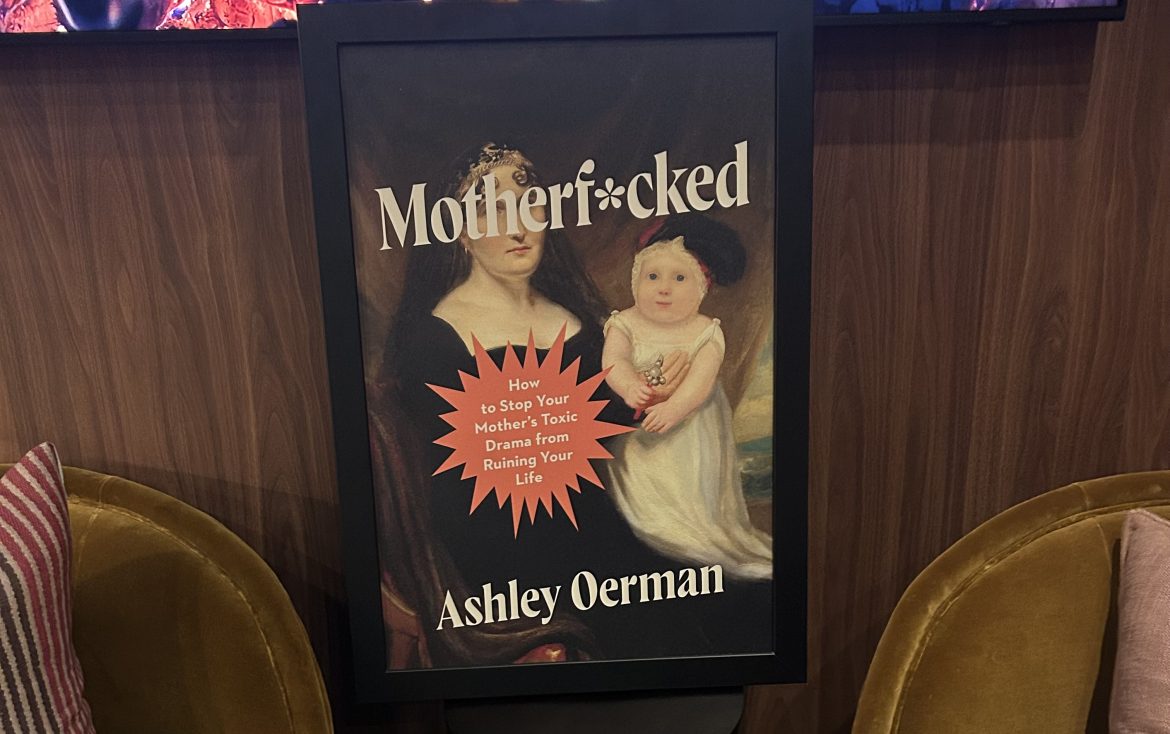 Photo of Motherf*cked cover at the launch party