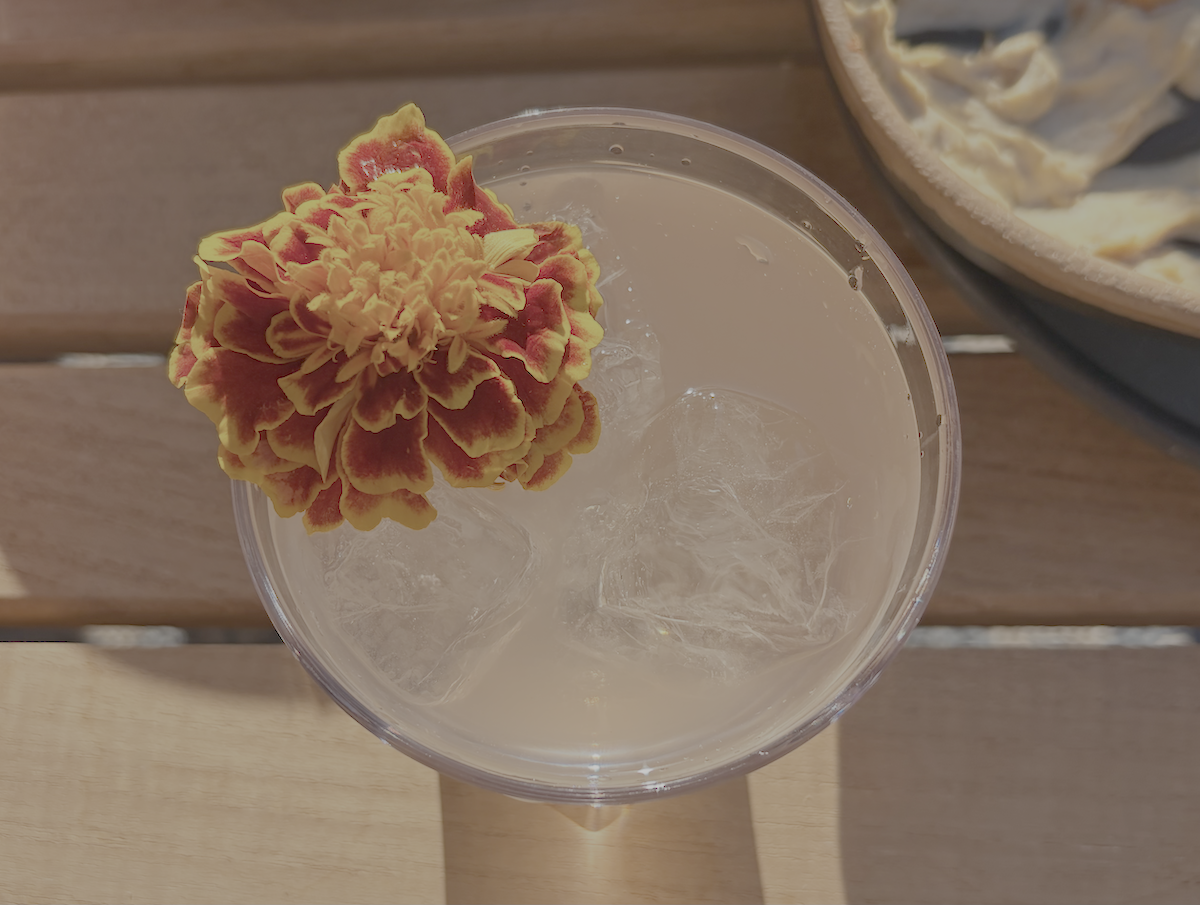 Rain or Shine cocktail by Lynette Marrero at The Roof at PUBLIC New York, made with Beefeater Gin, rhubarb, yuzu, and berry flavors.