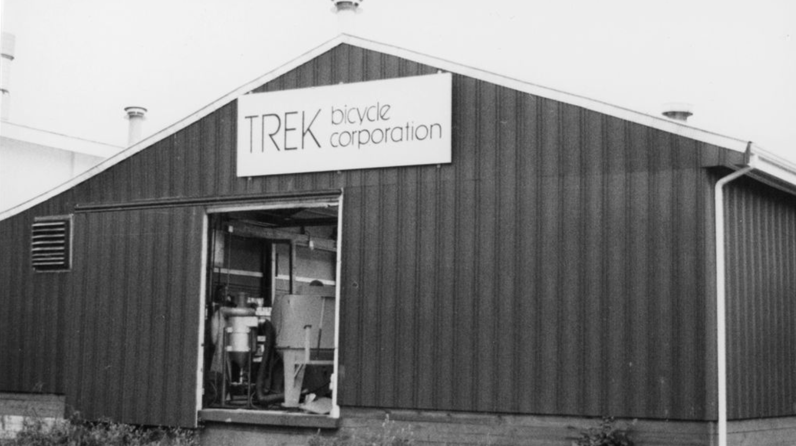 Red barn with Trek sign.